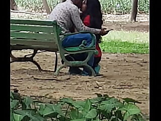 Beautiful Indian teen kissing in lodhi garden