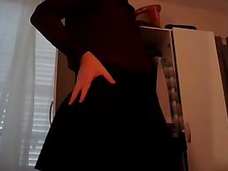 Young amateur cross dresser secretary teasing in sexy blouse and cute black skirt back from the office
