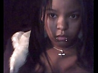Ebony teen licking huge boobs on webcam